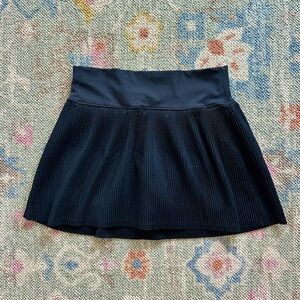 pleated black athletic skirt
